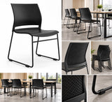 Soho stacking chair in a meeting room, stacked and in use