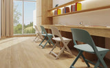 Nova Fold folding chairs at study desks in a school library